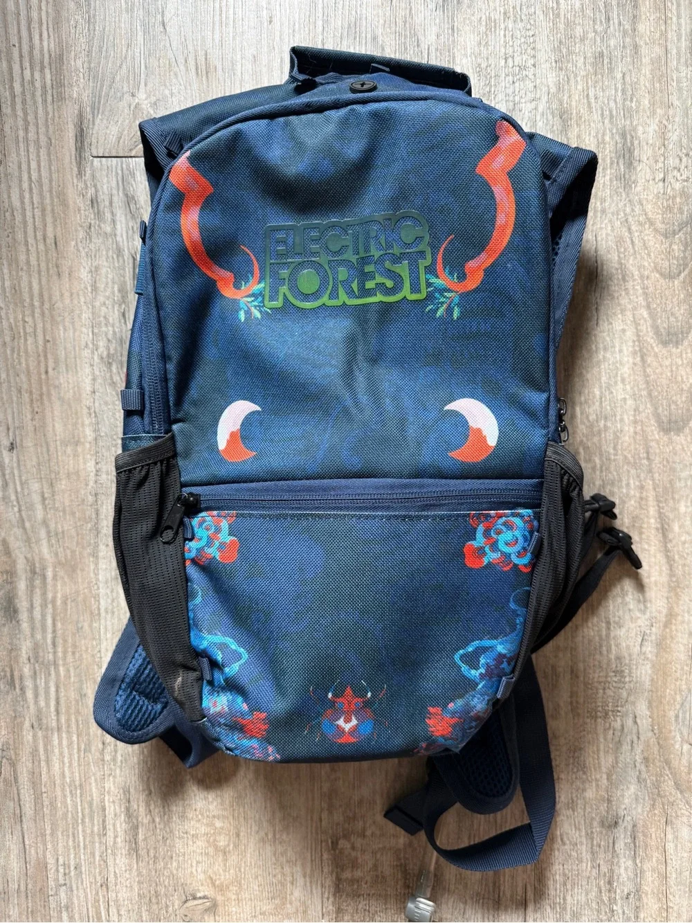 Electric forest festival backpack with water pouch